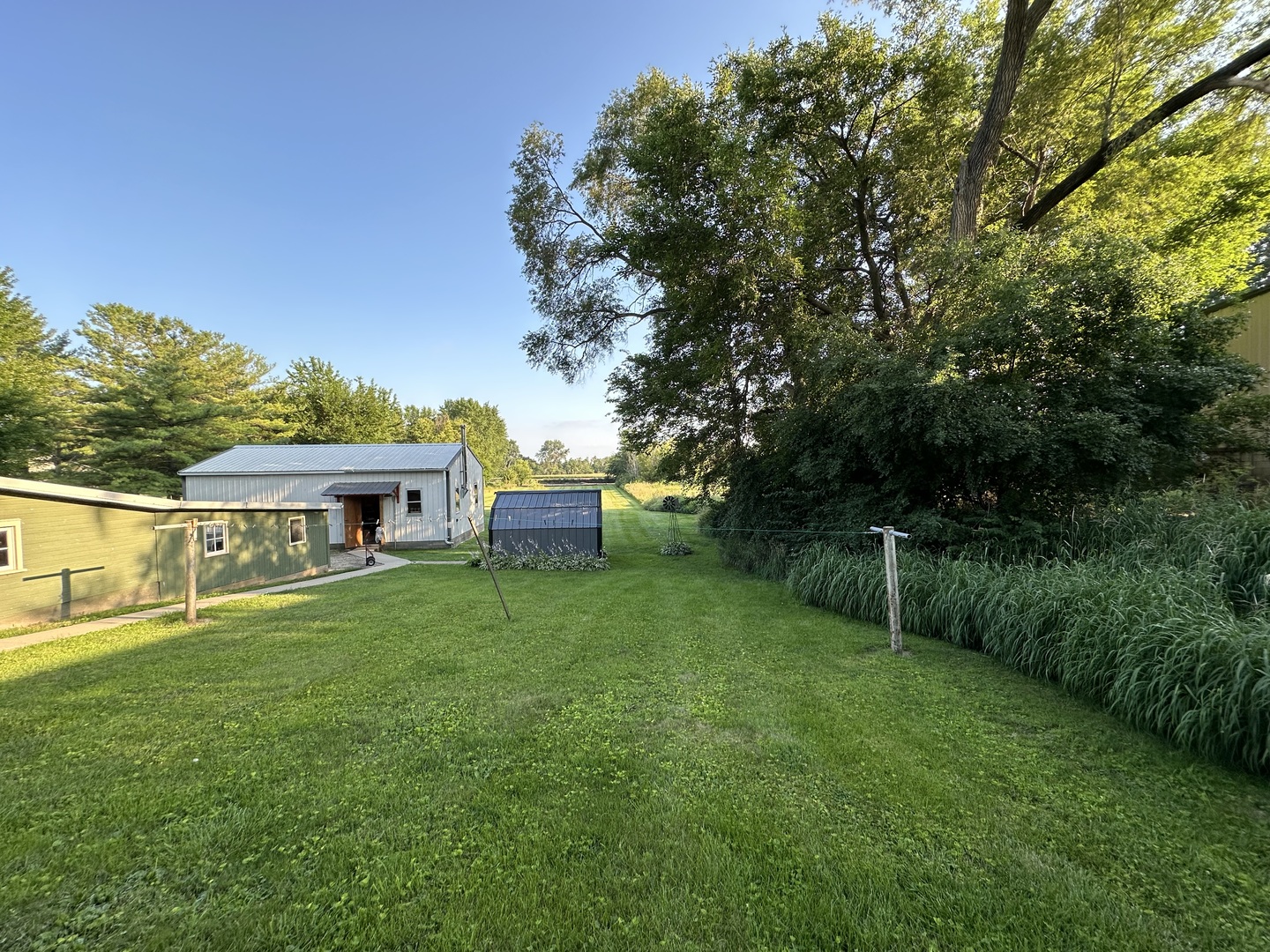 15445 Lincoln Road Morrison, IL 61270 - Photo 24 of 29 a view of a house with backyard and garden
