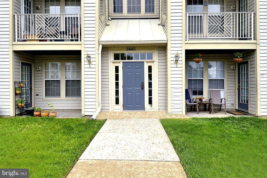 2445 Blue Spring Court, Unit 301 Odenton, MD 21113 - Photo 7 of 30 Welcoming Front Entry / Landscaped Grounds