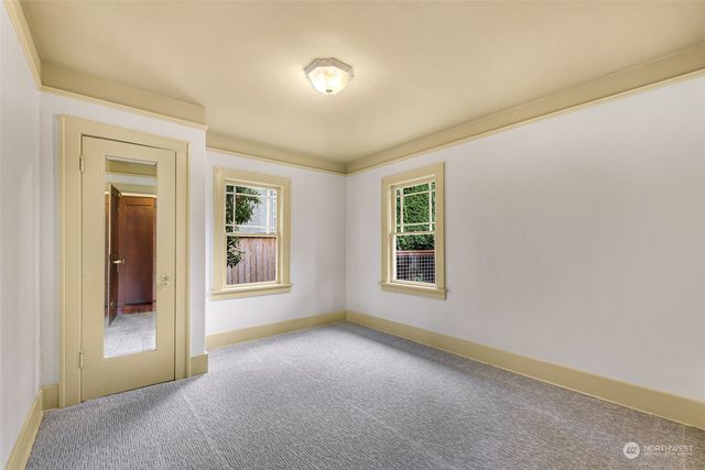 an empty room with windows