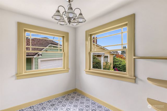 a view of a room that has a large window