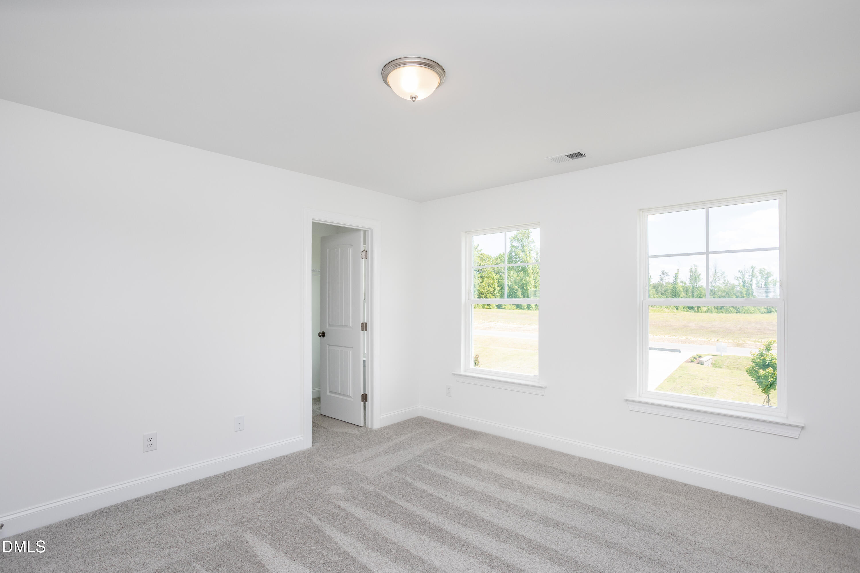 216 Cedar Rdg Trail Angier, NC 27501 - Photo 28 of 33 an empty room with windows