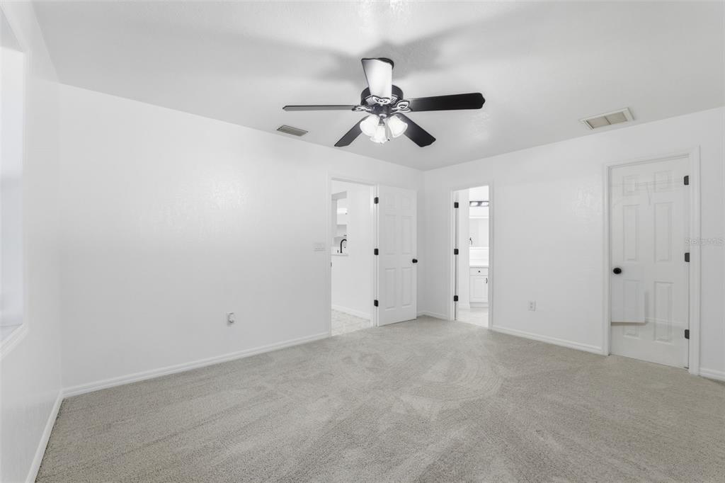 12515 Shadow Ridge Boulevard Hudson, FL 34669 - Photo 17 of 43 a view of an empty room