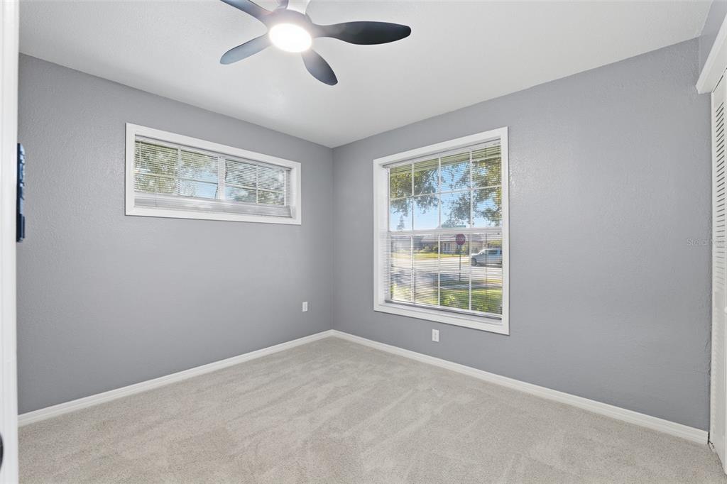12515 Shadow Ridge Boulevard Hudson, FL 34669 - Photo 22 of 43 a view of an empty room with a window