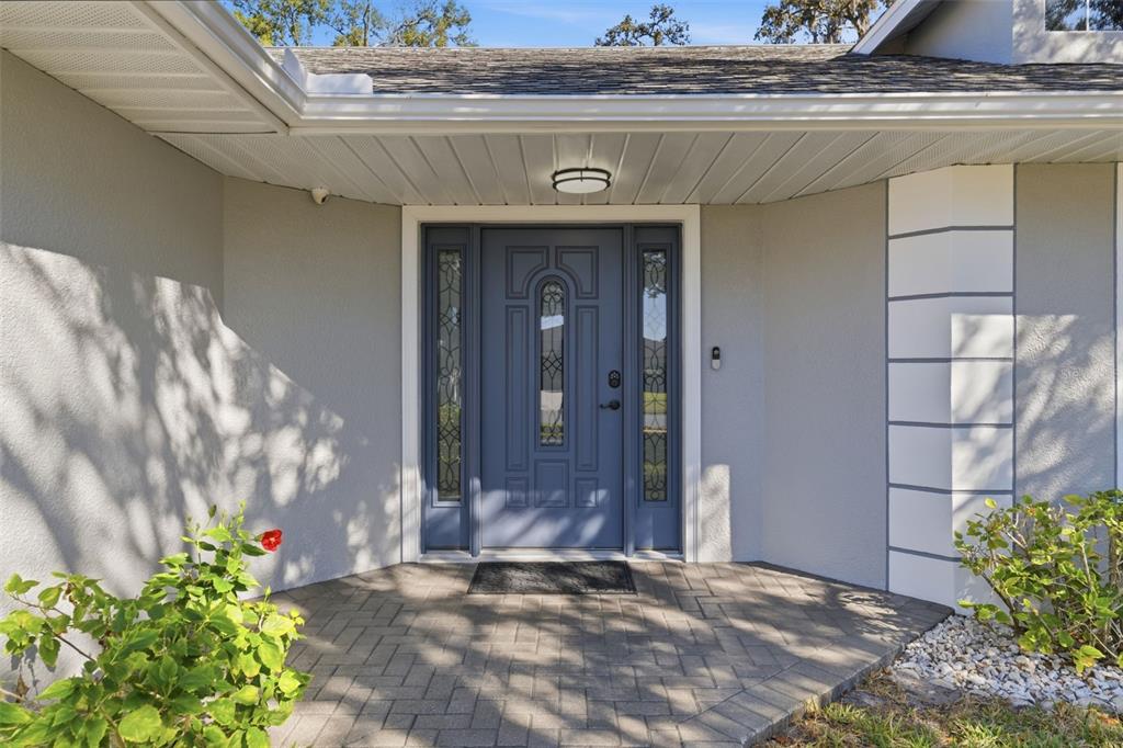 12515 Shadow Ridge Boulevard Hudson, FL 34669 - Photo 3 of 43 a view of a entrance of the house