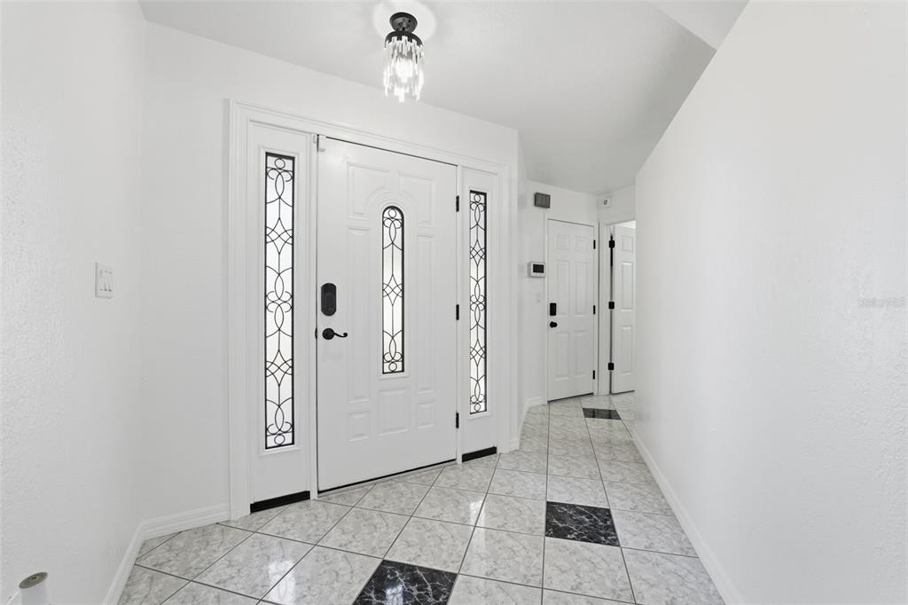 12515 Shadow Ridge Boulevard Hudson, FL 34669 - Photo 10 of 43 a view of a bathroom with a shower and closet