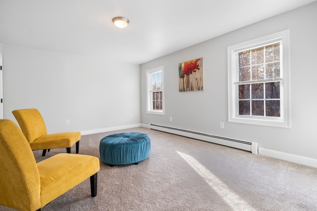 30 Foster Court Gardner, MA 01440 - Photo 18 of 37 a living room with furniture and a window