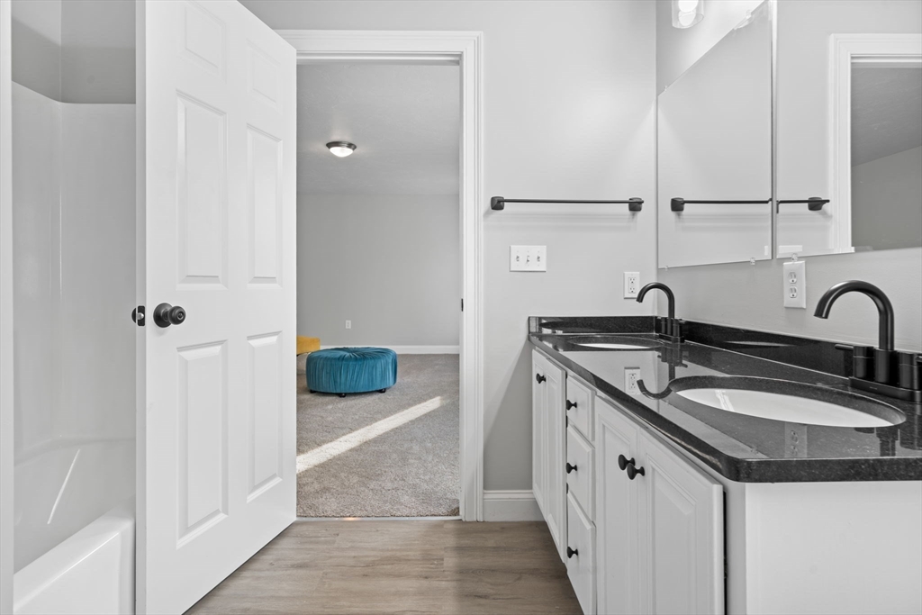 30 Foster Court Gardner, MA 01440 - Photo 22 of 37 a kitchen with stainless steel appliances granite countertop a sink and a refrigerator