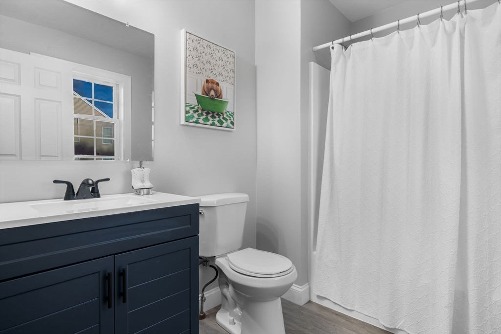 30 Foster Court Gardner, MA 01440 - Photo 23 of 37 a bathroom with a sink a toilet and a mirror