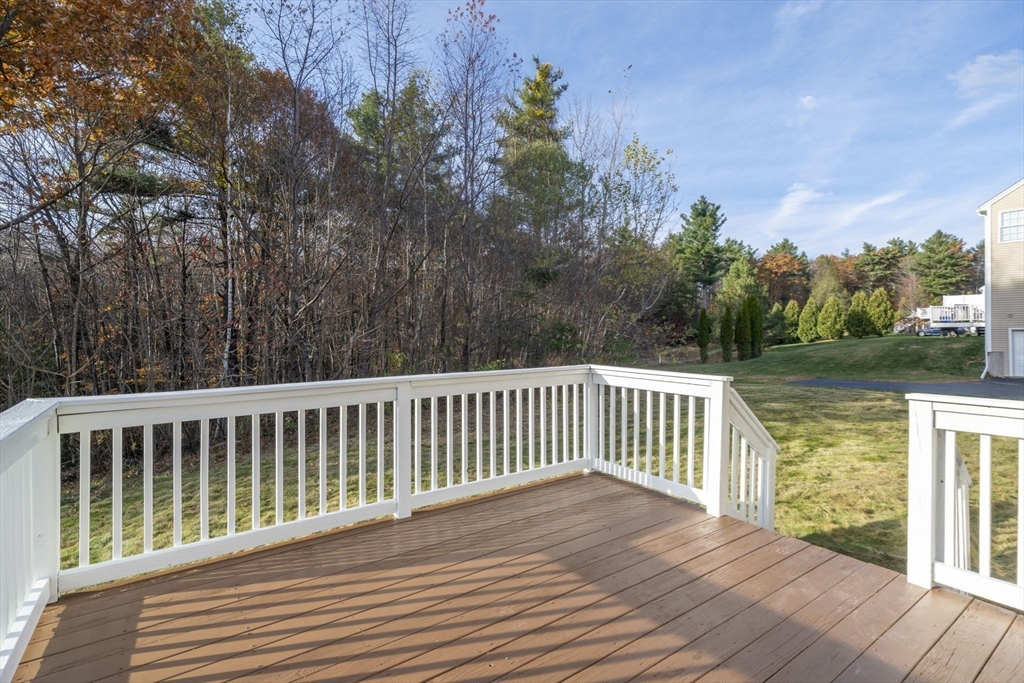 30 Foster Court Gardner, MA 01440 - Photo 27 of 37 a view of balcony with wooden floor and fence