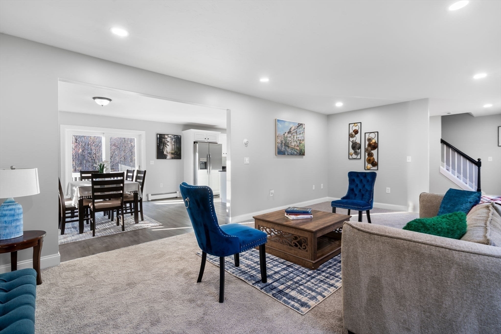 30 Foster Court Gardner, MA 01440 - Photo 5 of 37 a living room with furniture a piano and a table