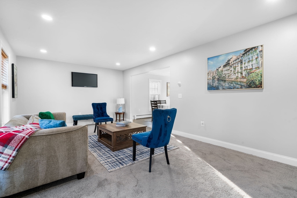 30 Foster Court Gardner, MA 01440 - Photo 6 of 37 a living room with furniture and a potted plant