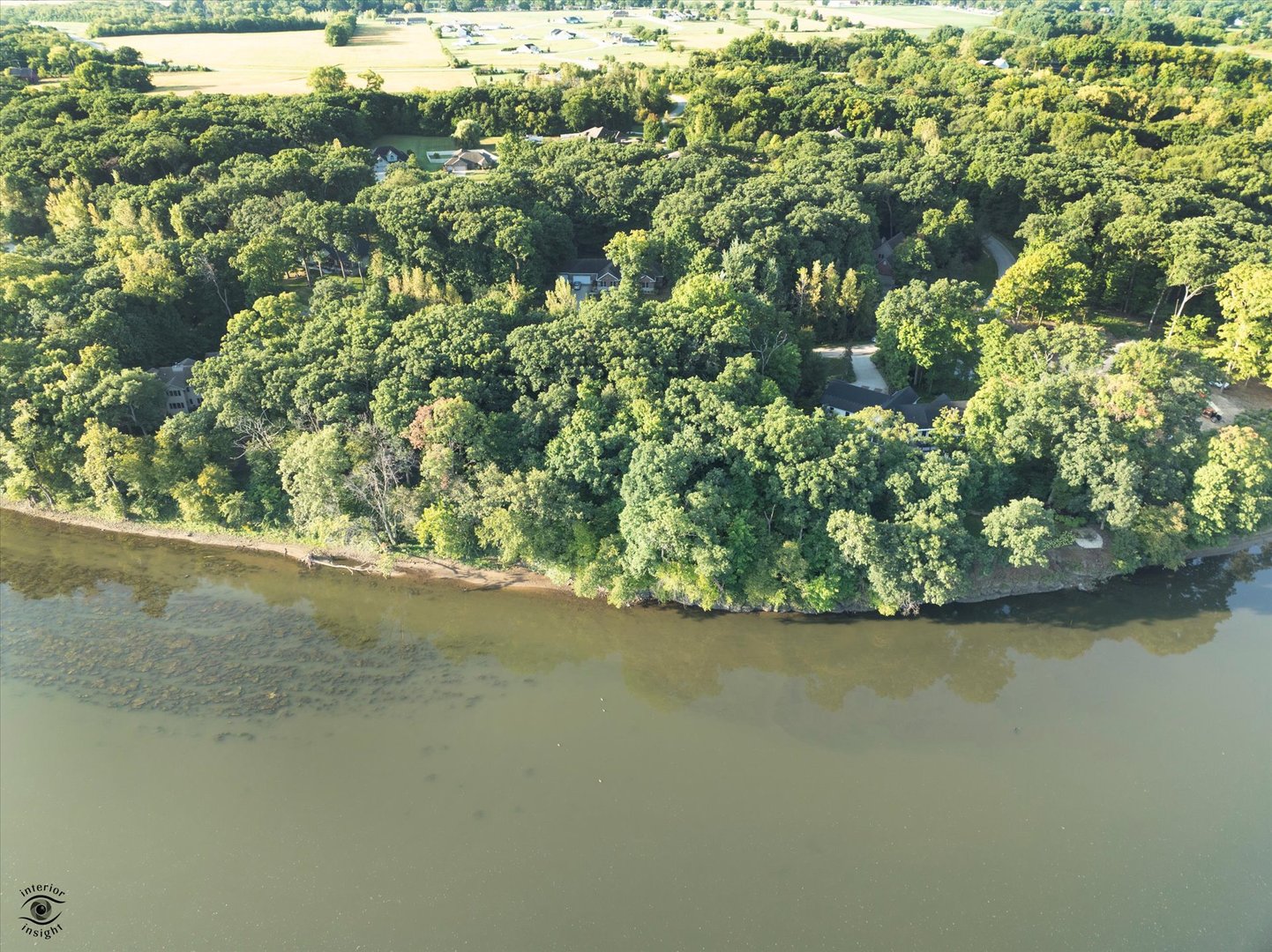 1785 Indian Trail Kankakee, IL 60901 - Photo 14 of 17 a view of a lake with a yard