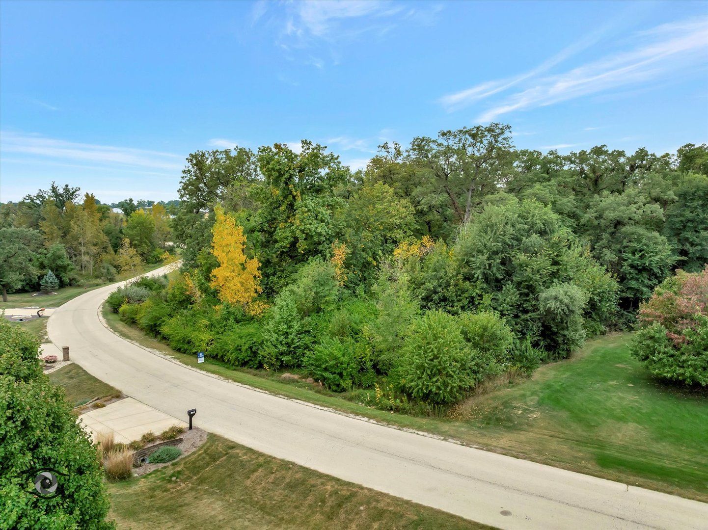 1785 Indian Trail Kankakee, IL 60901 - Photo 4 of 17 a view of a garden with a building in the background