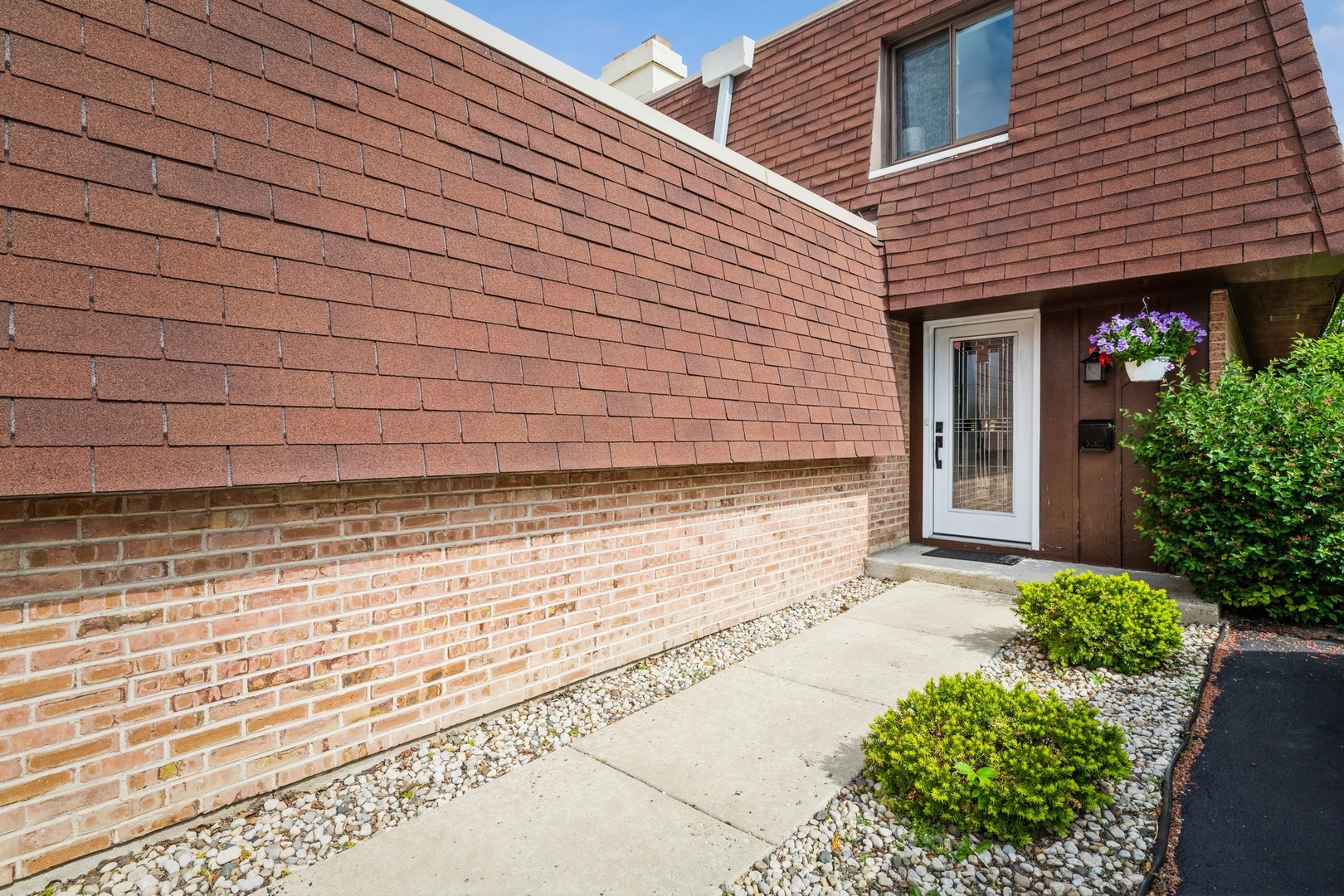 1063 Busse Highway Park Ridge, IL 60068 - Photo 1 of 16 a view of a backyard with pathway