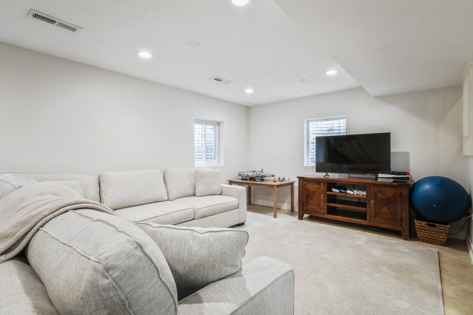 1063 Busse Highway Park Ridge, IL 60068 - Photo 14 of 16 a living room with furniture and a flat screen tv