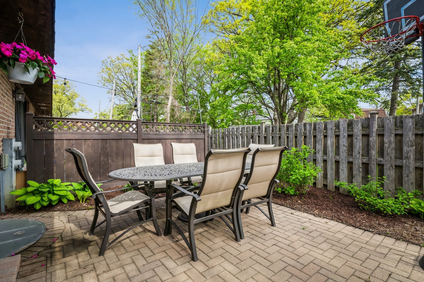 1063 Busse Highway Park Ridge, IL 60068 - Photo 16 of 16 a view of a chairs and table in a backyard