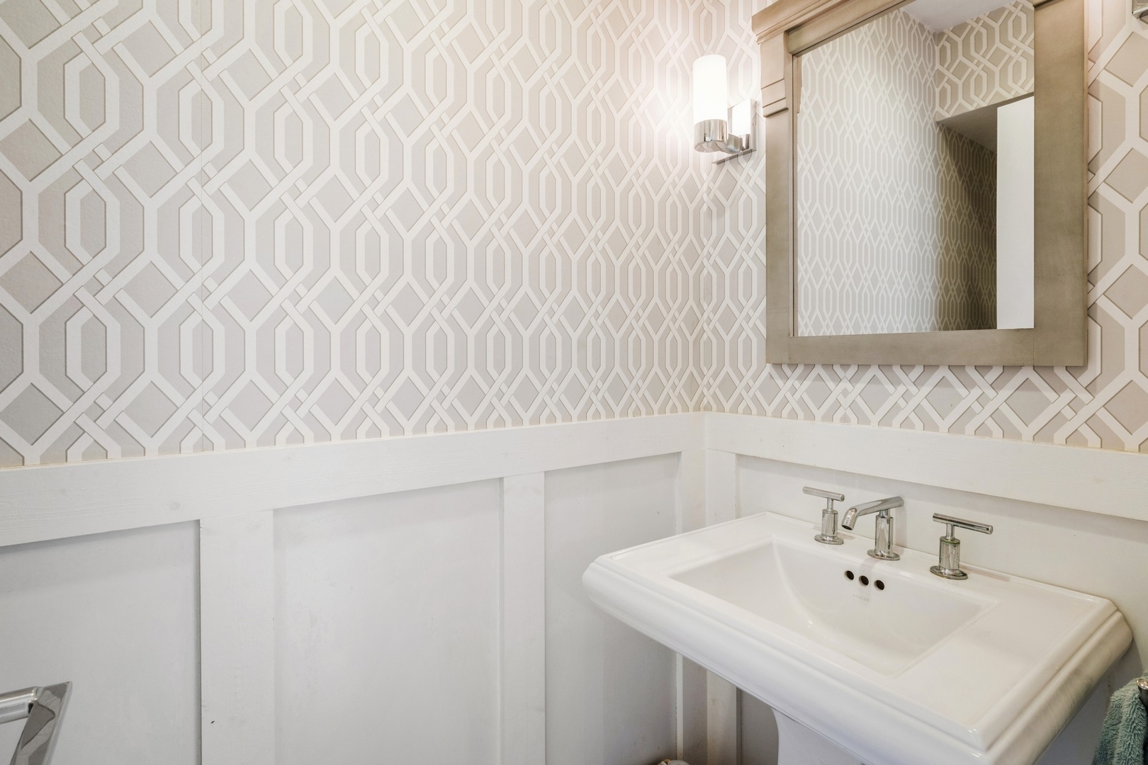 1063 Busse Highway Park Ridge, IL 60068 - Photo 8 of 16 a bathroom with a sink and a mirror
