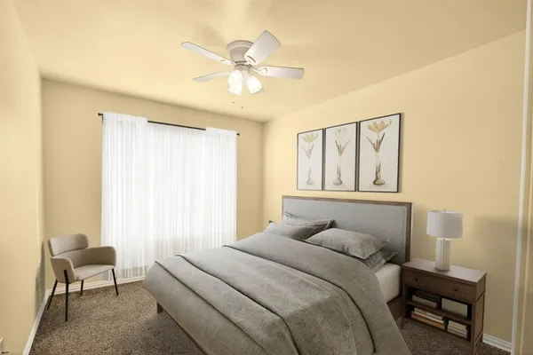 an empty room with a ceiling fan and a window