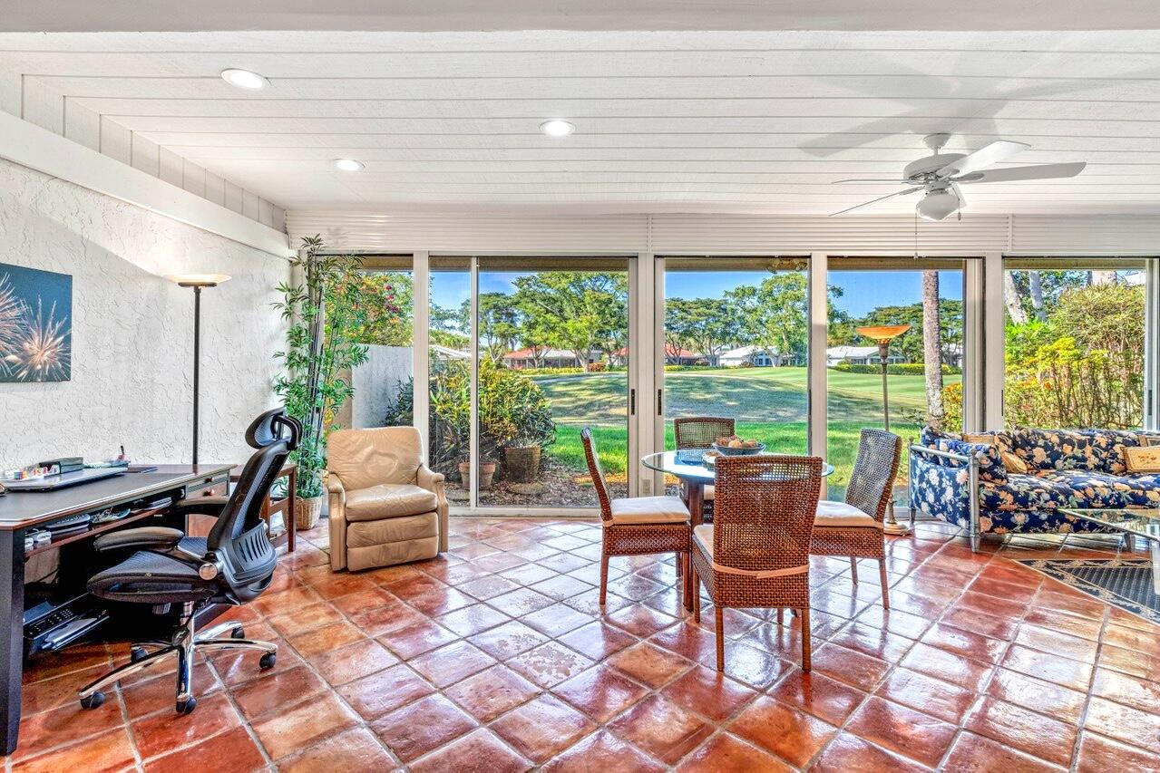 19 Glens Drive West Boynton Beach, FL 33436 - Photo 15 of 69 a living room with furniture and floor to ceiling windows