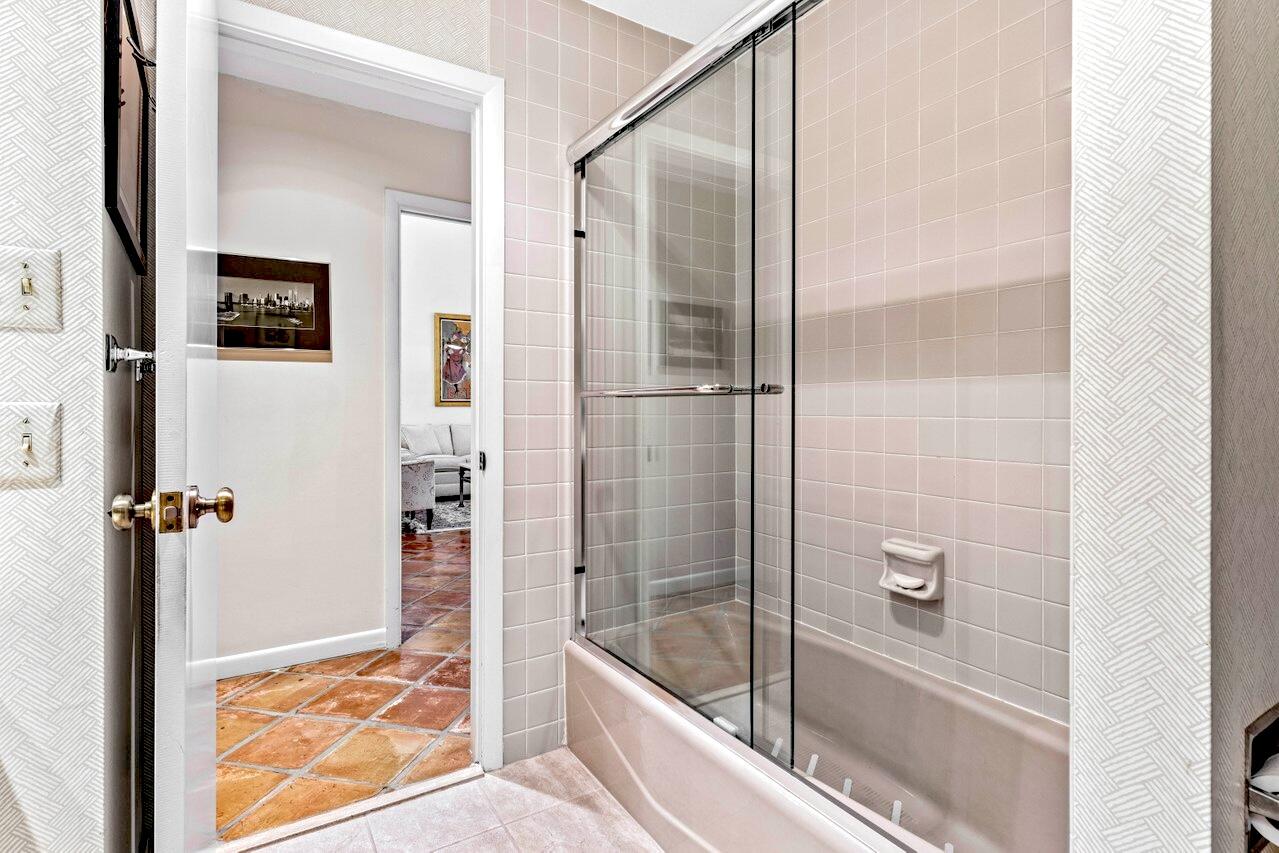 19 Glens Drive West Boynton Beach, FL 33436 - Photo 32 of 69 a bathroom with a bath tub and shower