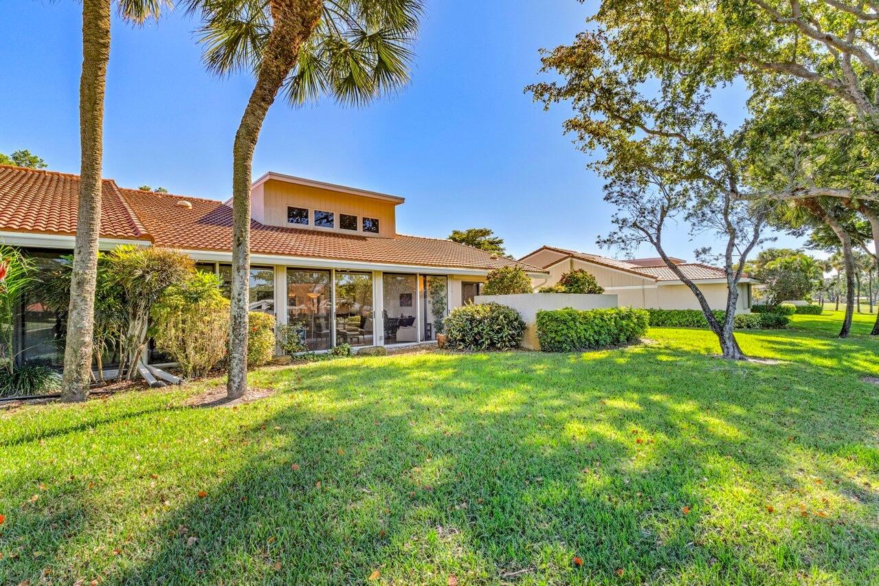 19 Glens Drive West Boynton Beach, FL 33436 - Photo 36 of 69 a view of a house with a yard