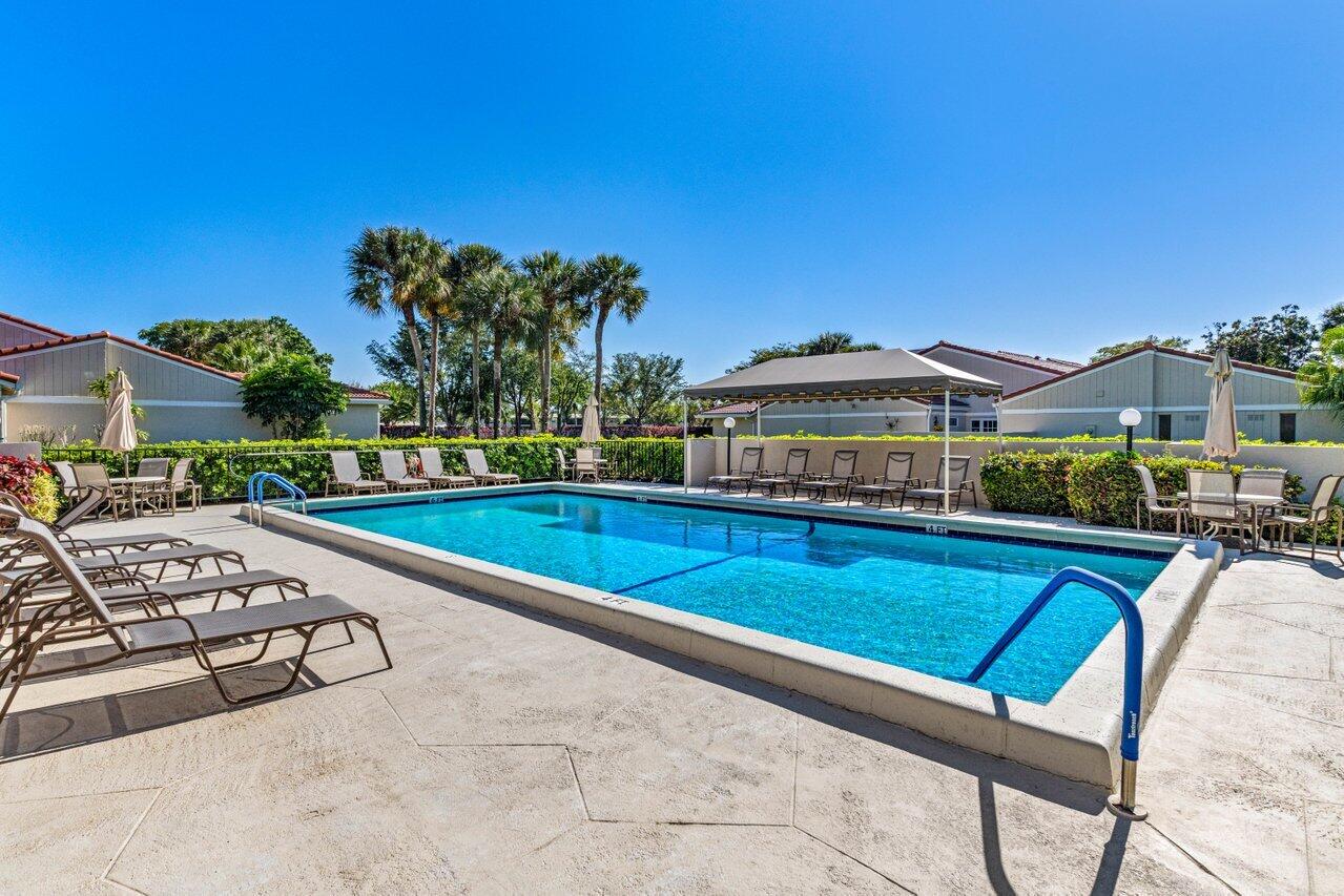 19 Glens Drive West Boynton Beach, FL 33436 - Photo 39 of 69 a view of swimming pool with outdoor seating and yard