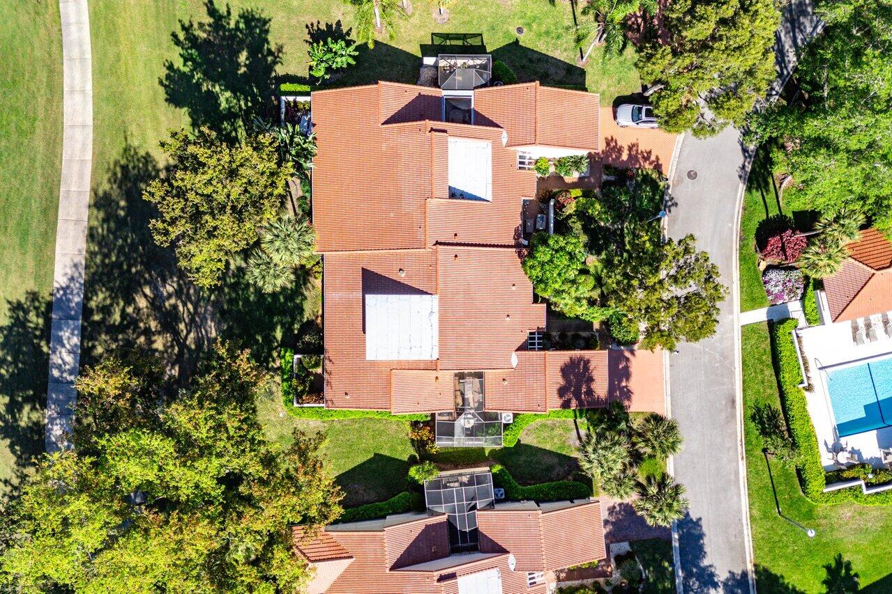 19 Glens Drive West Boynton Beach, FL 33436 - Photo 41 of 69 an aerial view of a house with a yard and garden