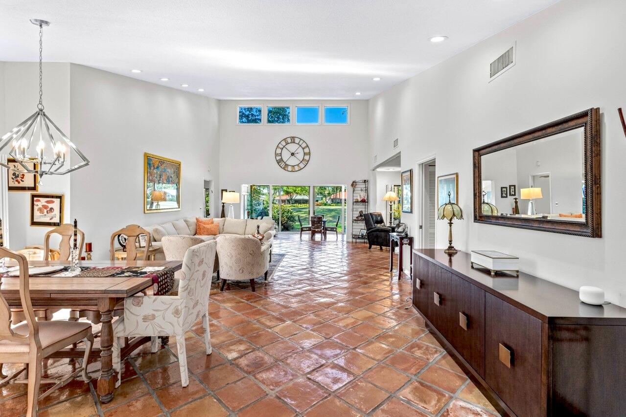 19 Glens Drive West Boynton Beach, FL 33436 - Photo 7 of 69 a living room with furniture and a large window