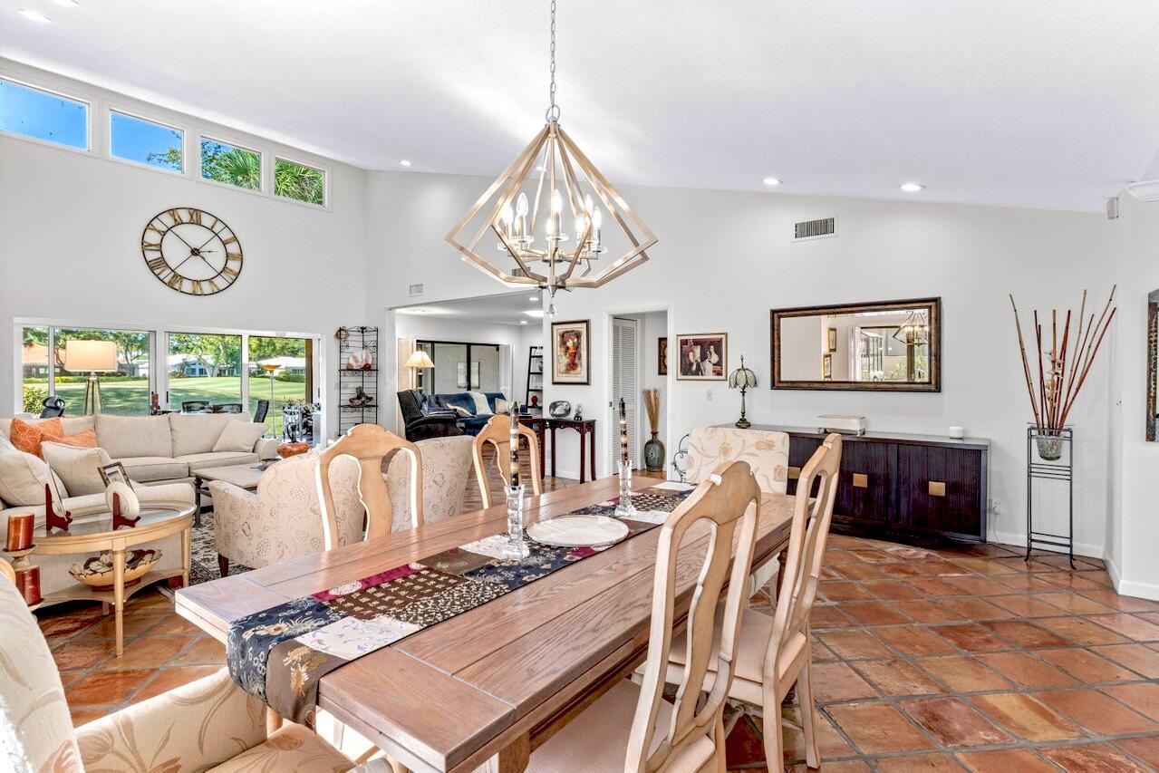 19 Glens Drive West Boynton Beach, FL 33436 - Photo 8 of 69 a living room with furniture a rug and a window