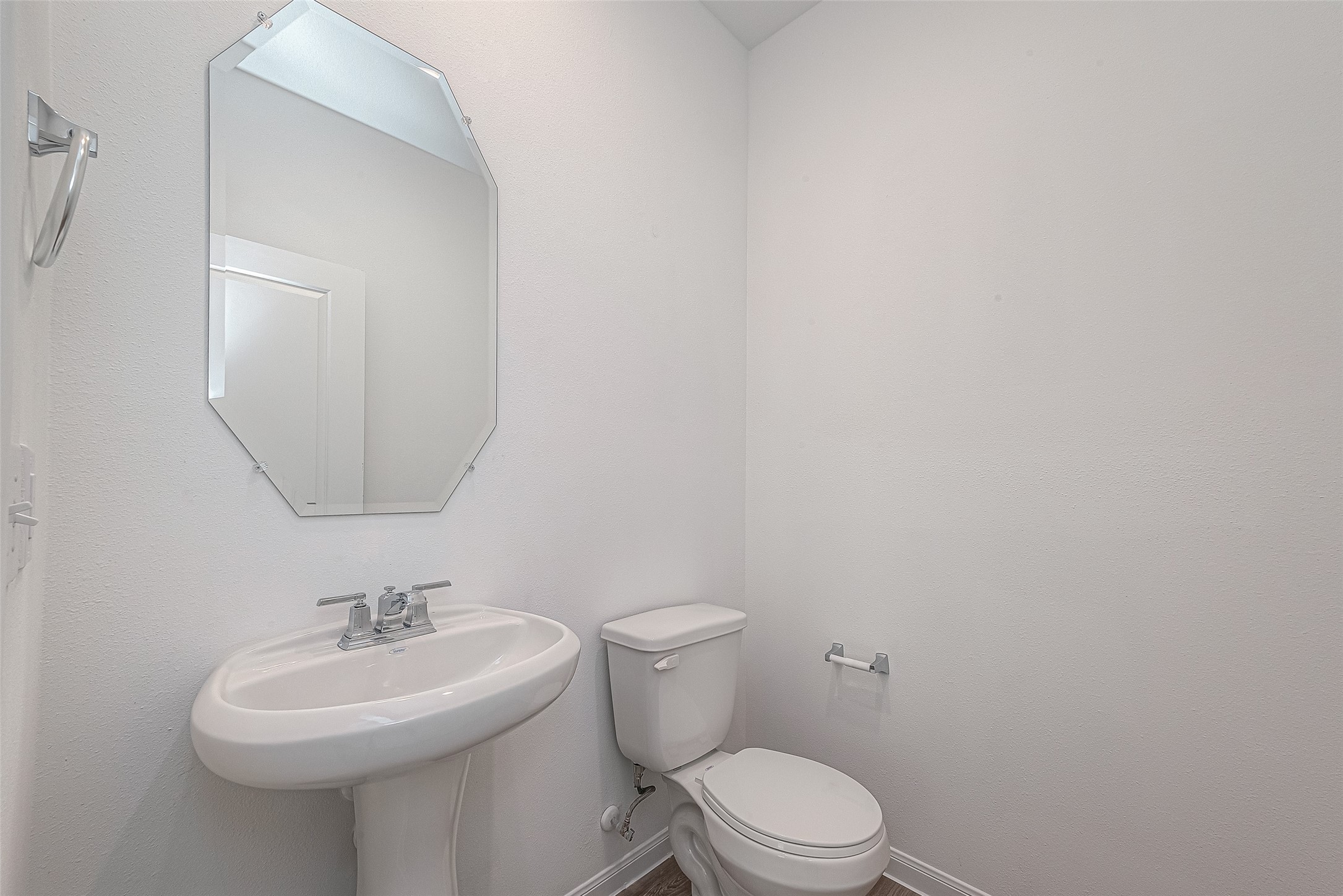 325 Maple Bark Trail Willis, TX 77378 - Photo 9 of 22 a bathroom with a sink a toilet and mirror
