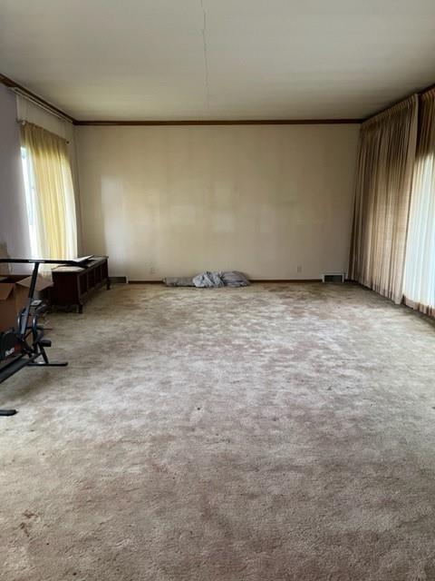 131 Stockton Avenue Uniontown, PA 15401 - Photo 5 of 14 an empty room with windows