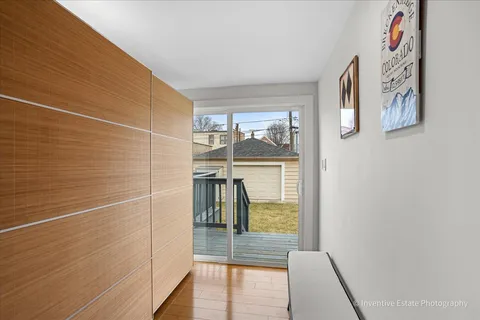a bathroom with a glass door shower and a sink