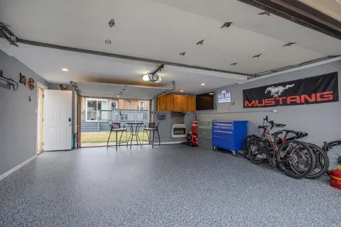 a room with gym equipment and a large window