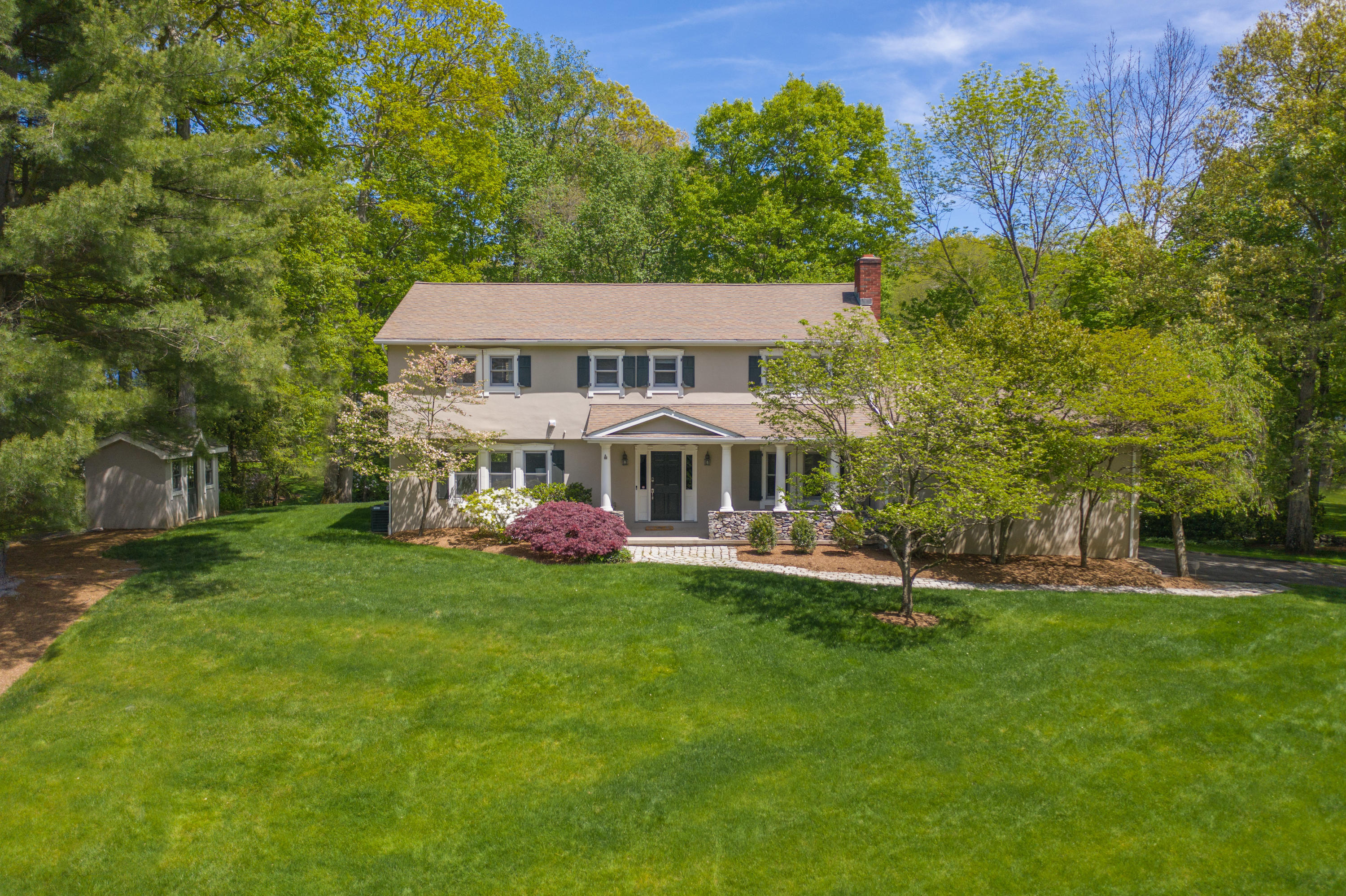 16 Barringer Road Darien, CT 06820 - Photo 1 of 43 a view of a house with a garden