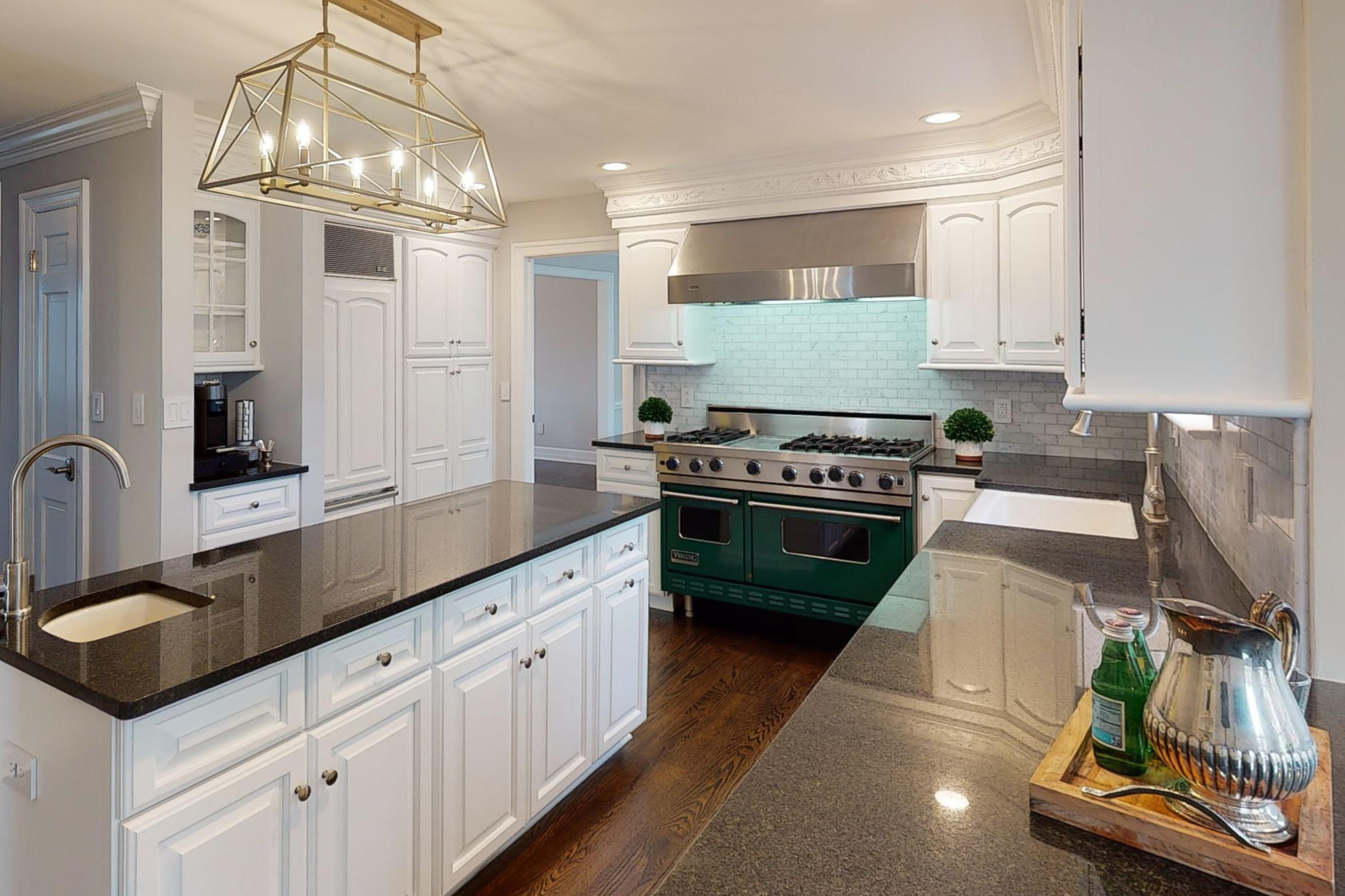 16 Barringer Road Darien, CT 06820 - Photo 19 of 43 a kitchen with cabinets a sink and appliances