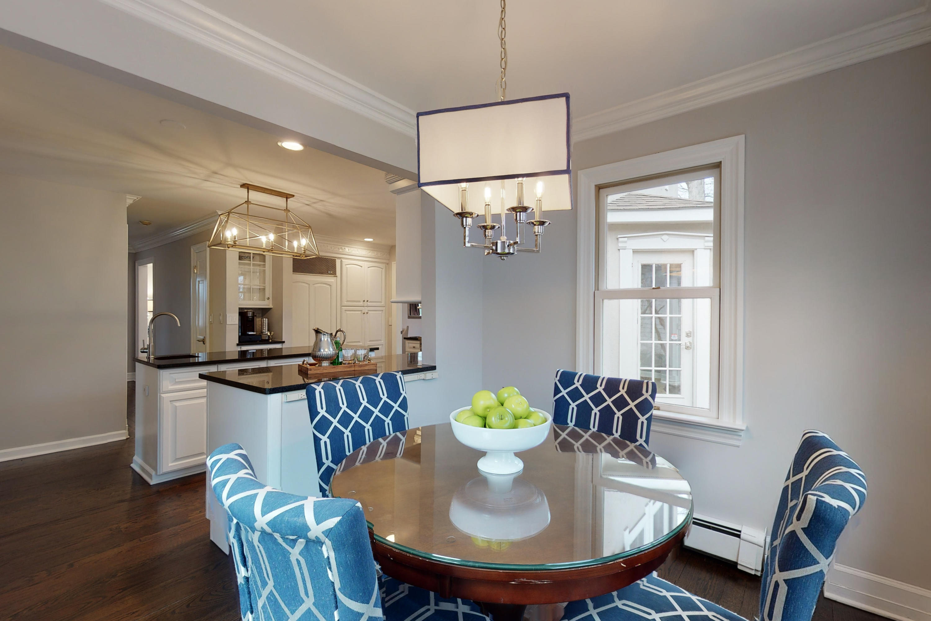 16 Barringer Road Darien, CT 06820 - Photo 21 of 43 a view of a dining room with furniture and wooden floor