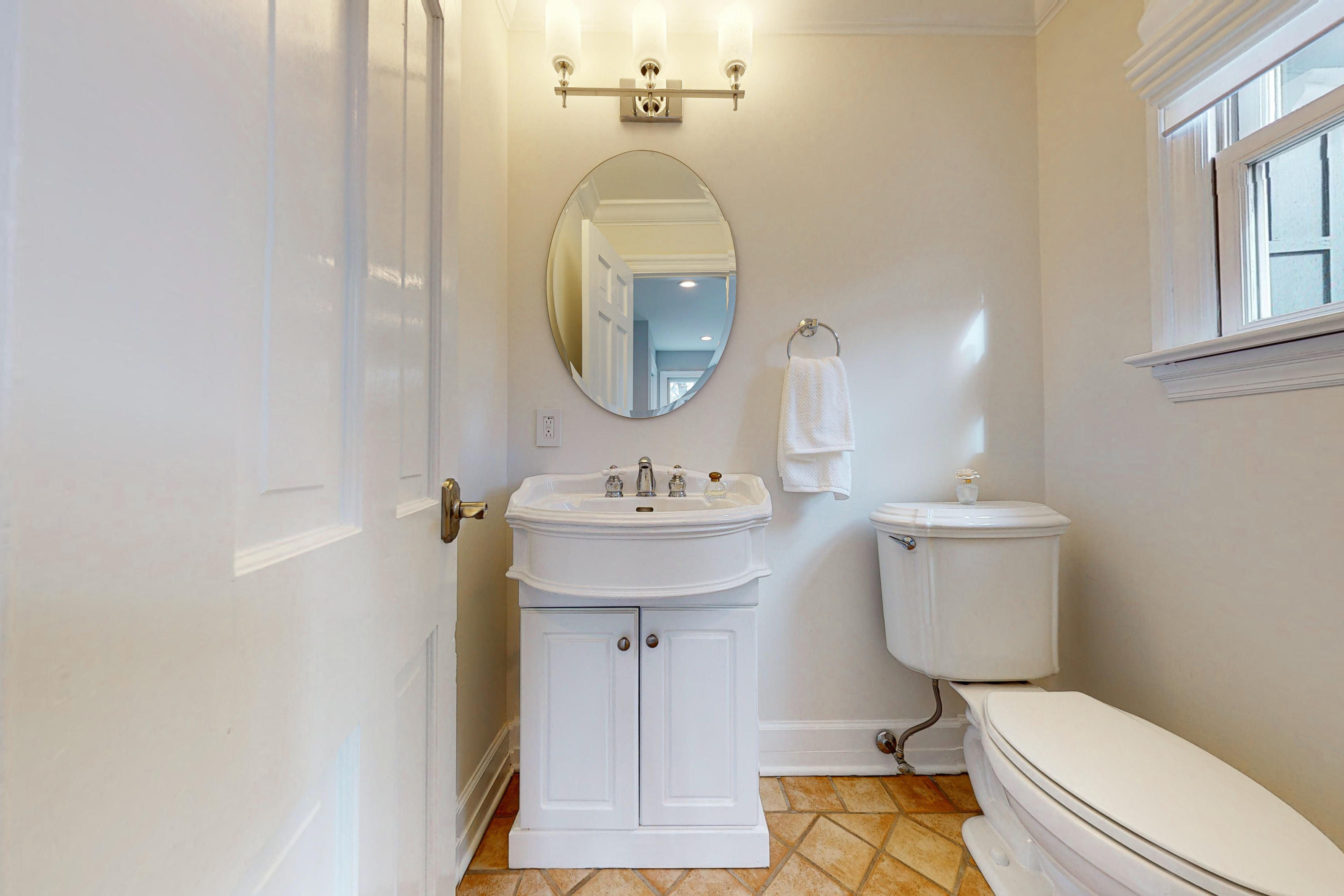 16 Barringer Road Darien, CT 06820 - Photo 23 of 43 a bathroom with a toilet a sink and mirror