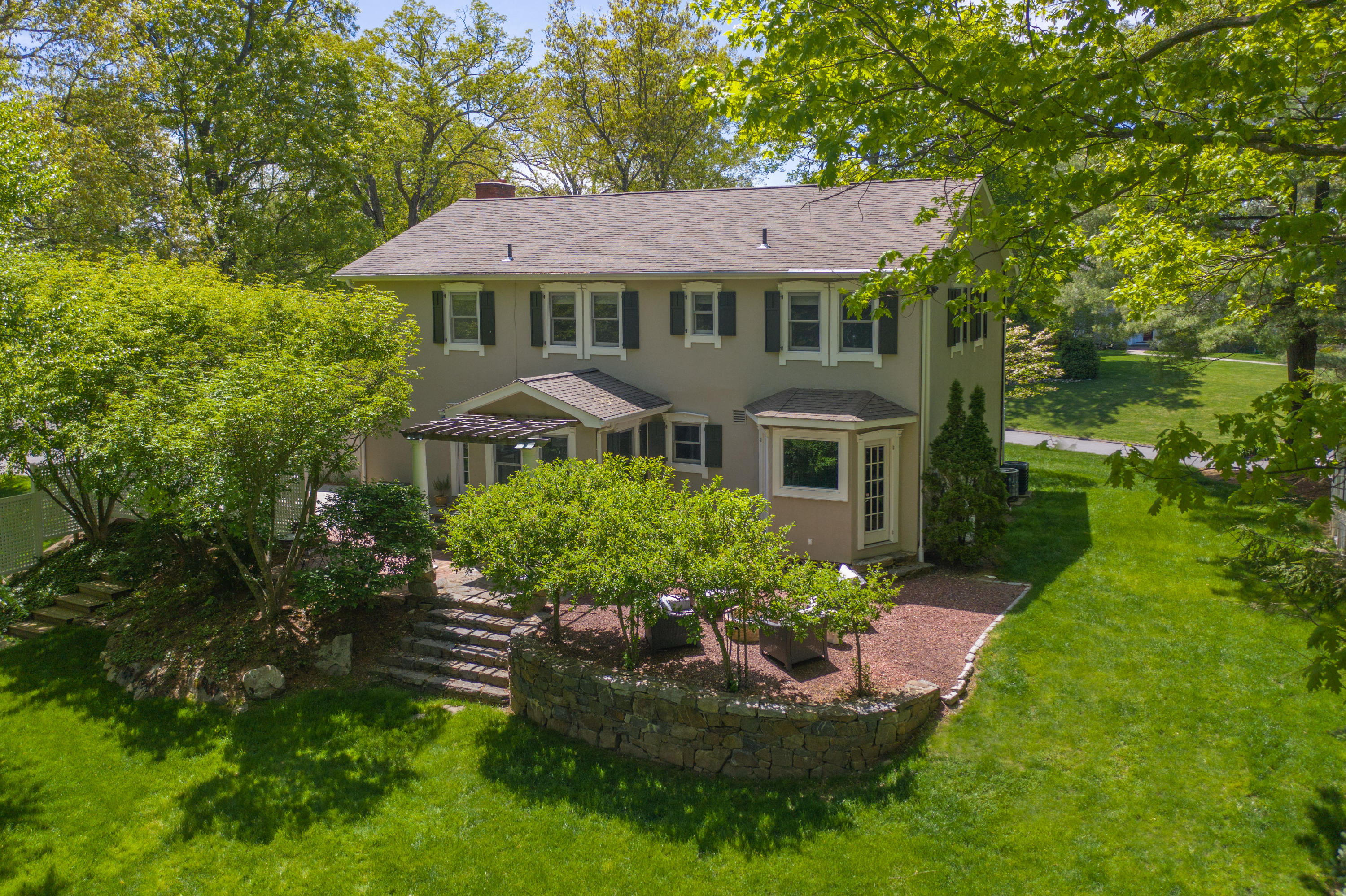 16 Barringer Road Darien, CT 06820 - Photo 3 of 43 a view of a house with a garden