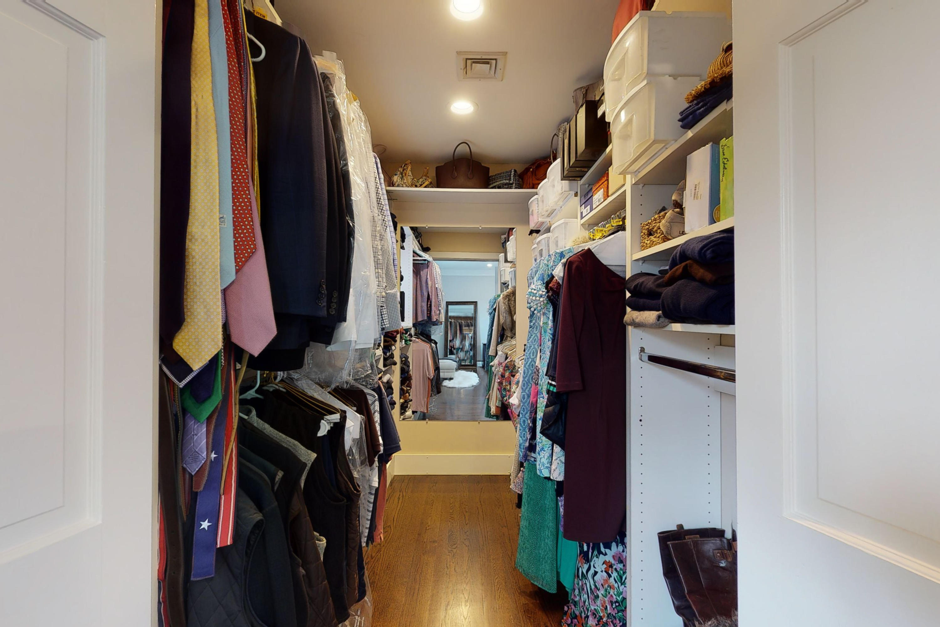 16 Barringer Road Darien, CT 06820 - Photo 32 of 43 a view of walk in closet with clothes and shoes