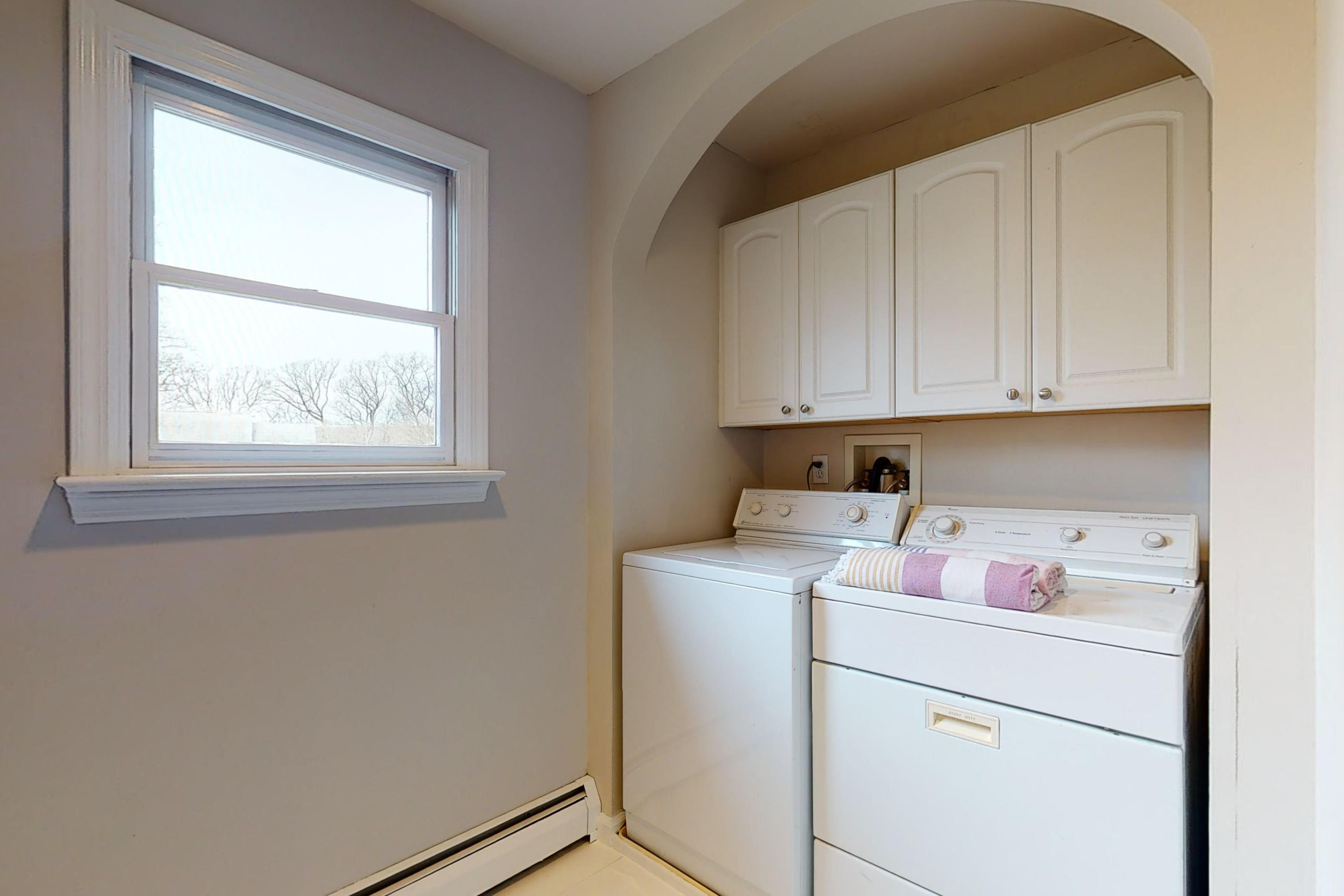 16 Barringer Road Darien, CT 06820 - Photo 33 of 43 a view of storage and utility room with washer and dryer