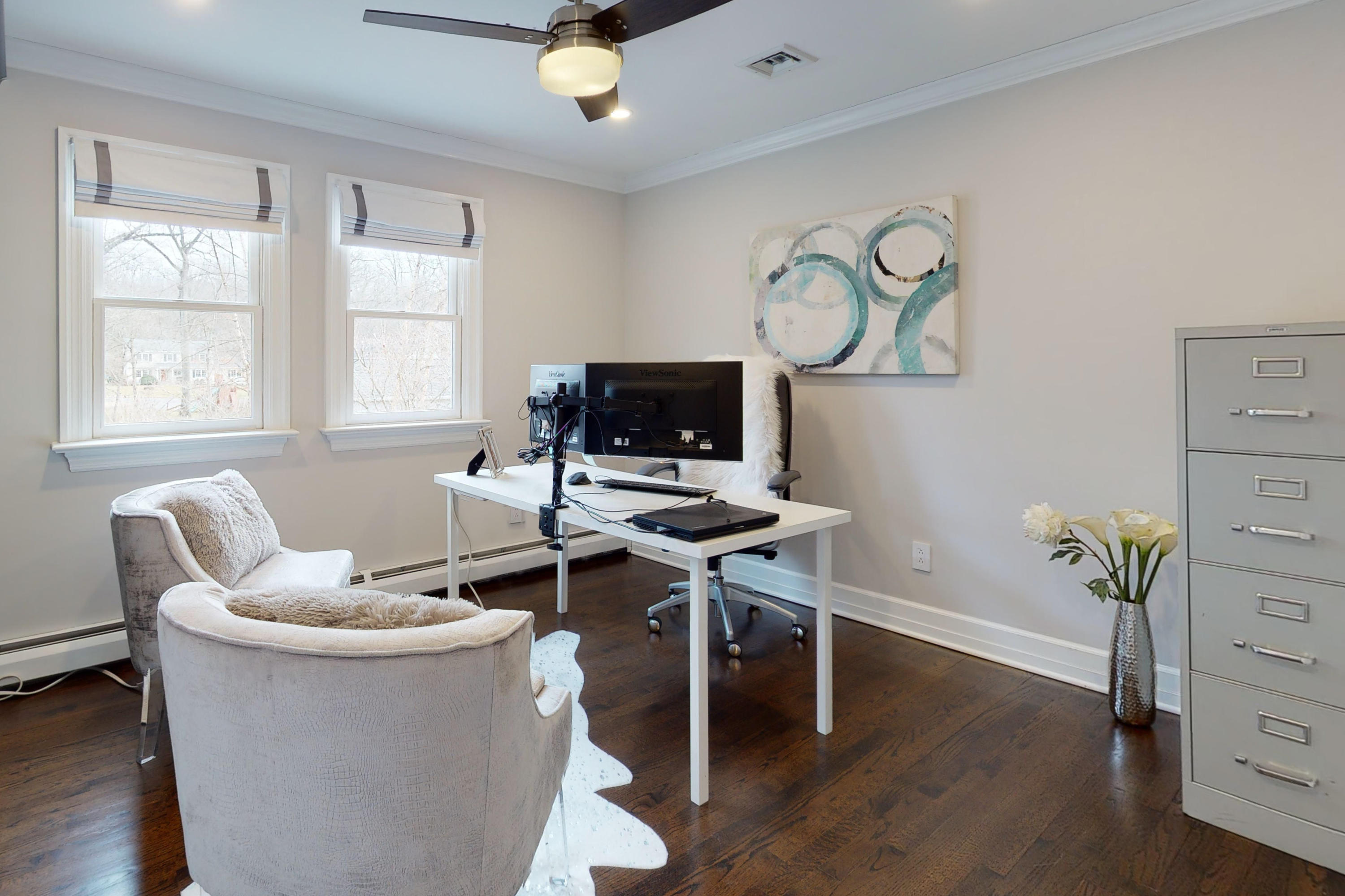 16 Barringer Road Darien, CT 06820 - Photo 34 of 43 a living room with furniture a window and wooden floor
