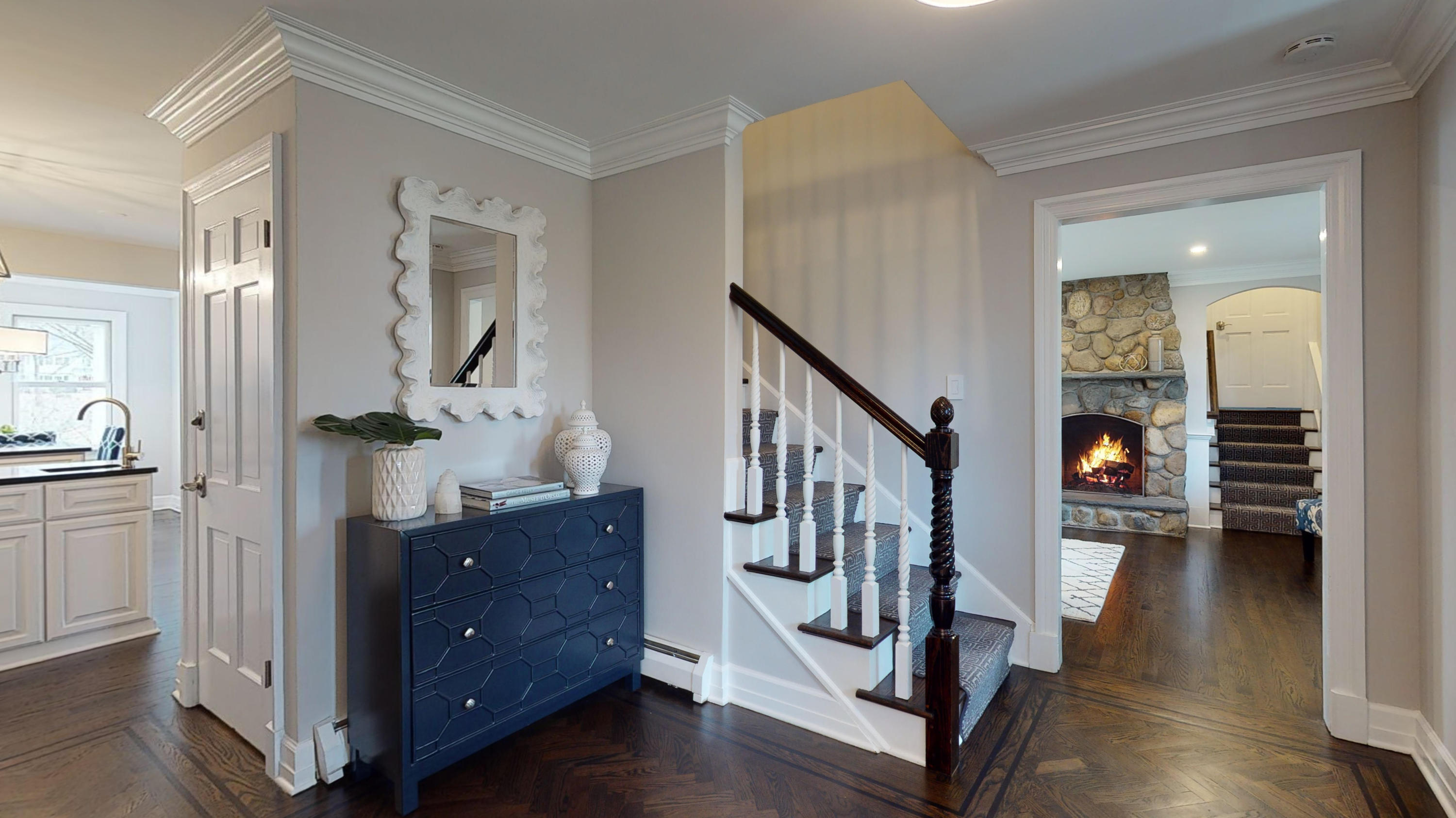16 Barringer Road Darien, CT 06820 - Photo 6 of 43 a hall way with furniture a mirror and a furniture