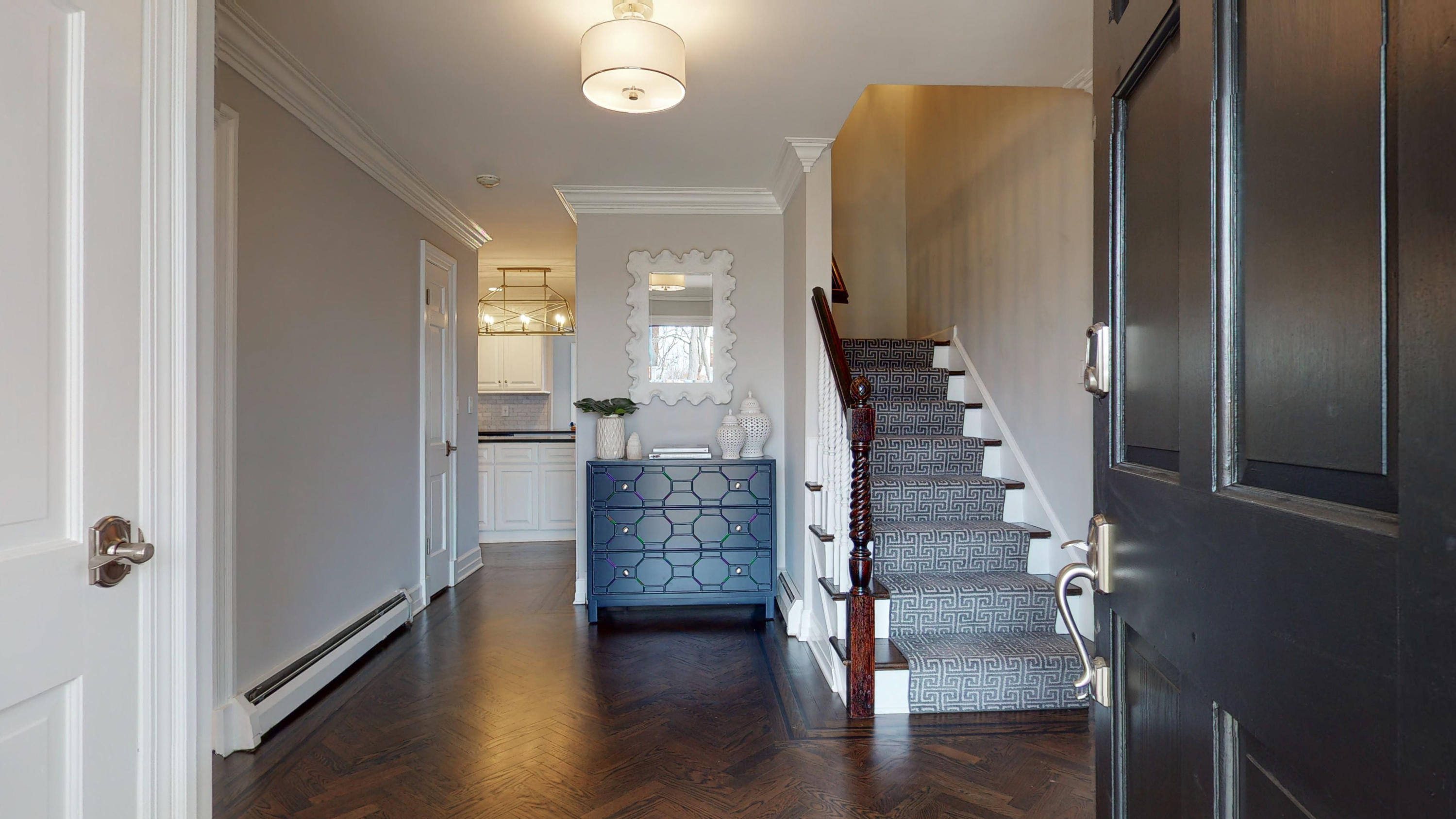 16 Barringer Road Darien, CT 06820 - Photo 7 of 43 a view of a hallway with wooden floor and entryway
