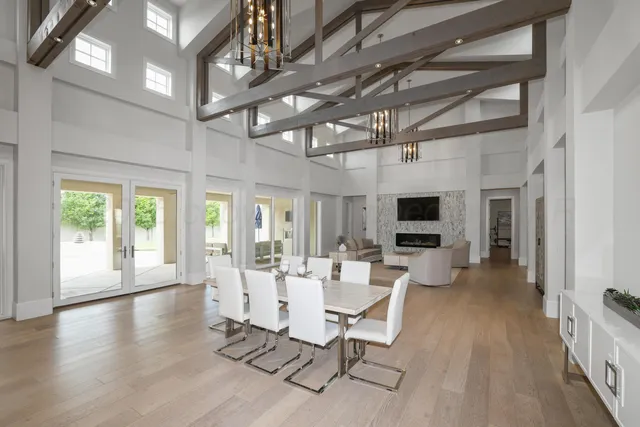 a large bathroom with a large mirror vanity and double sink