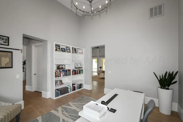a kitchen with a sink and a refrigerator
