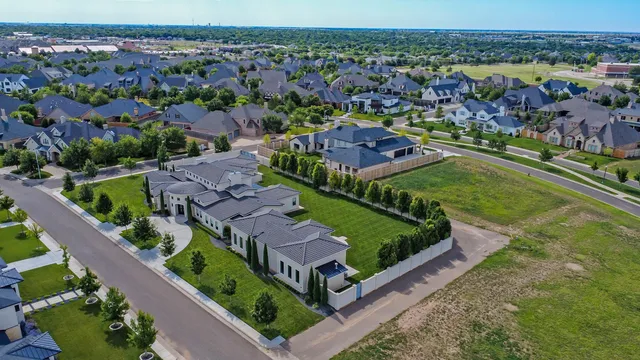 an aerial view of a house with a garden