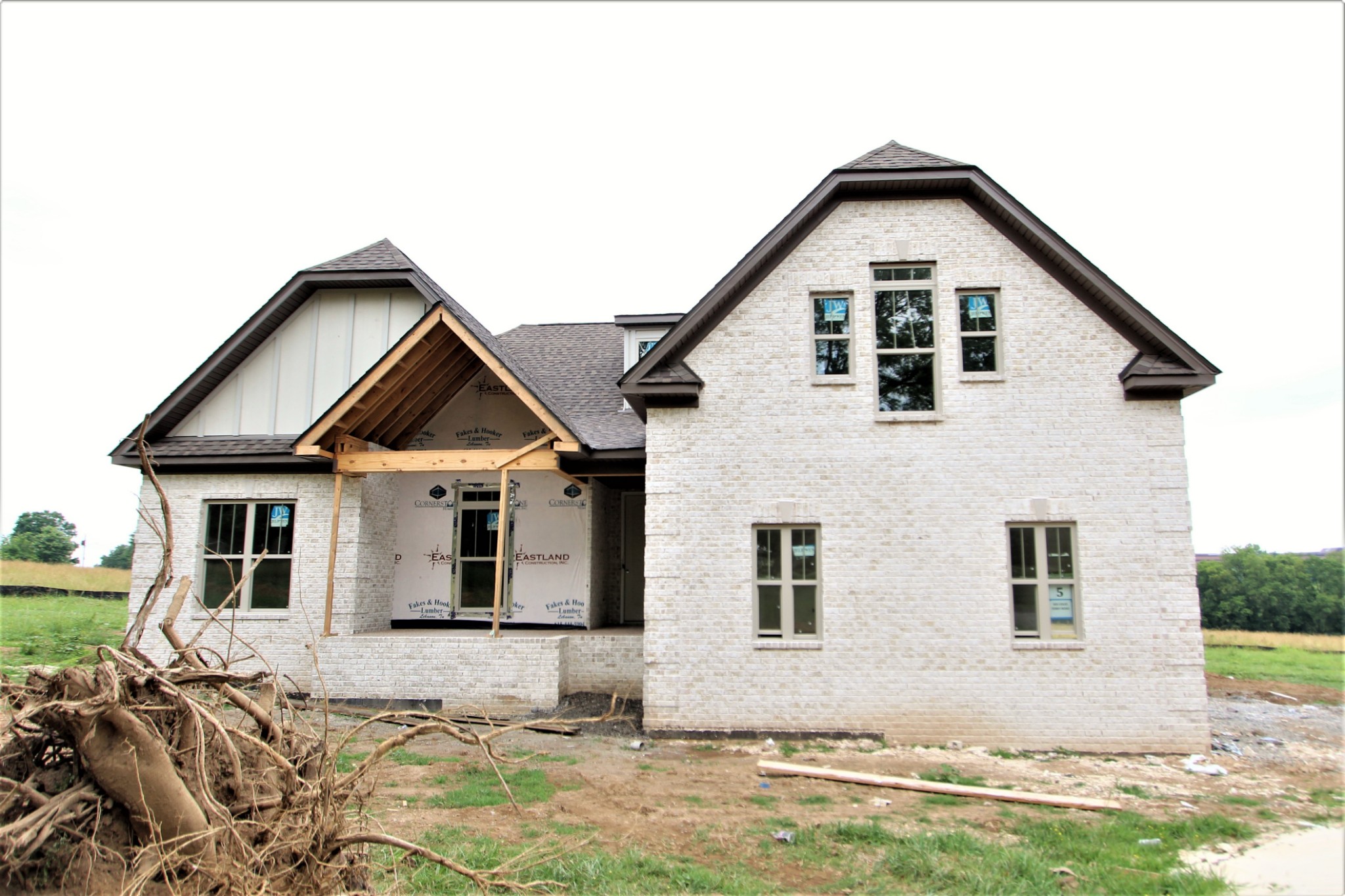 a view of house with yard