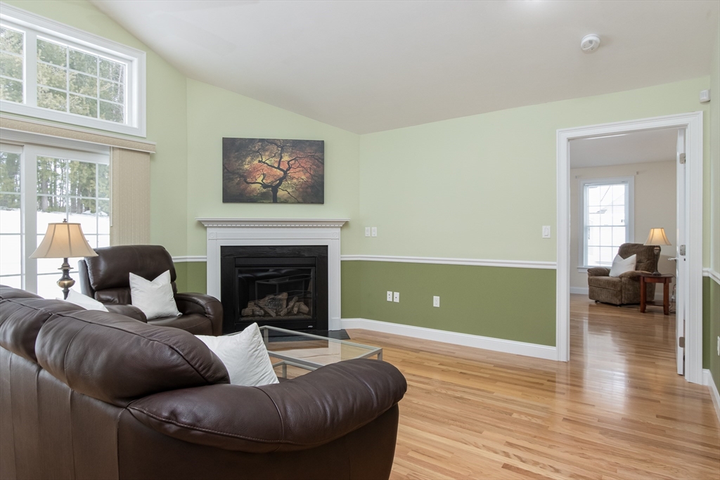 43 Old Mill Circle Westminster, MA 01473 - Photo 13 of 30 a living room with furniture and a fireplace