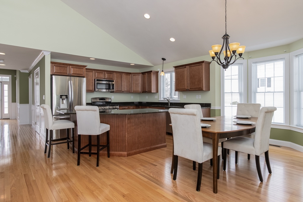 43 Old Mill Circle Westminster, MA 01473 - Photo 9 of 30 a view of a dining room with furniture window and wooden floor