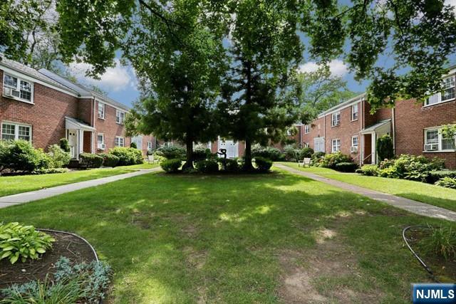 100 Huguenot Avenue, Unit 6B Englewood, NJ 07631 - Photo 22 of 24 a view of a house with backyard